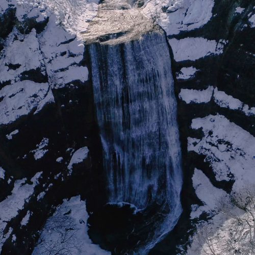 Agia Anna waterfalls with snow near Nestorio