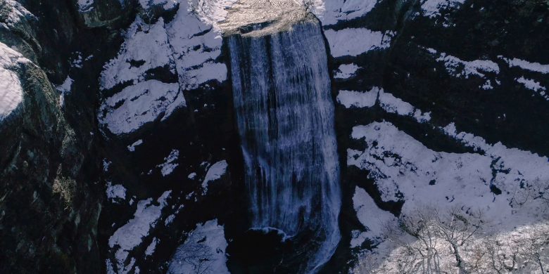Agia Anna waterfalls with snow near Nestorio